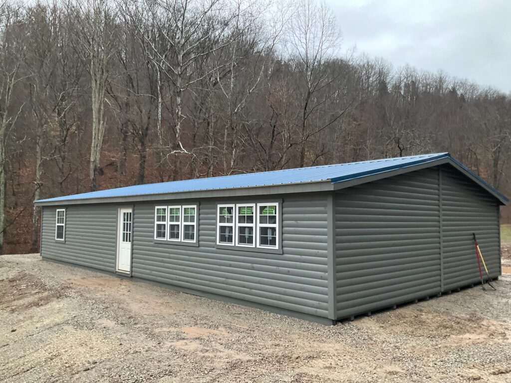 Log Double Wide Cottage Premier (Gable Porch)